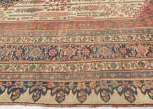 This grand scale antique Bidjar carpet features the evocative Bid Majnun design a poetic and symbolic layout named for the weeping branches of the trees and reminiscent of the legendary figure Majnun in Persian literature. The rare ivory ground provides a luminous backdrop for a striking garden composition, filled with stylized willows, cypresses, and flowering shrubs rendered in rich natural dyes.