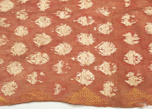 19th century Phulkari is a tradition of folk embroidery from the Punjab region that encompasses both India and Pakistan. This Phulkari was crafted in four strips and composed  of ivory and gold silken thread atop terracotta dyed cotton.