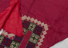 These trouser cuffs were handmade in Turkmenistan during the 20th Century.   Turkmen women traditionally wear colorful ankle length dresses with baggy trousers in contrasting color and decorated bands. These trousers feature wonderful detailed embroidery bands near the ankles in blue, red, green and ivory on a magenta cloth.