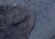 This Burqa was crafted in Afghanistan during the late 20th century. 
A burqa is a full-body garment that covers a woman's face and body. This burqa is made of periwinkle blue fabric with crimping around the back and floral embroidery below mesh opening for the eyes.
It is in good condition with small patches and some sun fading.
Special Provenance: Formerly in the collection of Yosi Barzilai Sarajo