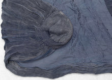 This Burqa was crafted in Afghanistan during the late 20th century. 
A burqa is a full-body garment that covers a woman's face and body. This burqa is made of periwinkle blue fabric with crimping around the back and floral embroidery below mesh opening for the eyes.
It is in good condition with small patches and some sun fading.
Special Provenance: Formerly in the collection of Yosi Barzilai Sarajo