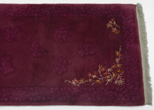 This Art Deco rug was handwoven in Tientsin, China during the second quarter of the 20th century. 
This Deco rug is quite calm and elegant.  An asymmetric inner border of branches and leaf like shapes in autumnal shades provide substance and balance to the delicate tone on tone patterning found in the the field and around the perimeter.