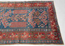 This unusual Karaja rug features a Tree of Life composition rendered in a vivid palette of indigo, madder, ivory, and soft terracotta tones. It combines the technical precision and geometric boldness typical of Karaja weavings with a spiritually resonant format more commonly associated with urban workshop rugs.