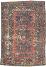 This Shirvan rug was woven in the Caucasus during the late 19th century.
It features three powerful leshgi stars on an earthy red ground full of various rosettes and protection symbols.  Encapsulated by multiple individualized borders including rosettes, sunbursts, and calyx and serrated leaves. A very handsome palette of blues, reds, greens and aubergine is accentuated by glowing coral and orange among other tones.