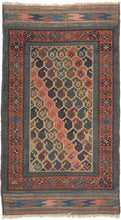 baluch The field design is composed of alternating rows of botehs that aligned on the diagonal on a camel ground. The botehs are big and plump in contrasting tones of purples, blues and pinks including an early synthetic hot pink that isn't for Baluch purists but adds some visual interest for the rest of us!  Finished on both ends with original interlocking lightning bolt kilims.