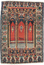 This Senneh rug was woven during the second quarter of the 20th Century.
Wonderful but still folky perspective of looking into a building with three arches each with a hanging lantern. The perspective is accentuated by a grid which runs into a columned platform before breaking off into the glowing red distance. The piece is further differentiated by the addition of a zoomorphic alter directly in the center.