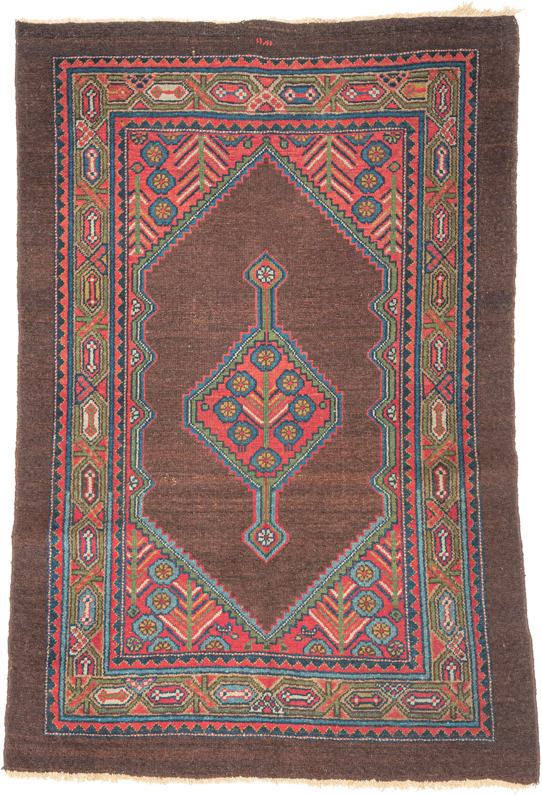 Antique Serab
It features a rosette filled central medallion filled on an open chocolate ground and flanked by floral spray cornices in vibrant rose, sky blue, fern green and ivory.  Nicely framed by a chocolate brown perimeter which strikes the perfect balance with the open field and further highlights the use of the uncommon tone.