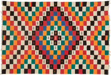 This blanket was likely woven by the Fulani people in Mali during the middle of the 20th century.
It was woven in multiple stripes which have been attached horizontally. It features an eye dazzling checkerboard composed of white, black, red, green, blue and a sunny yellow-orange. Four individual squares around the perimeter are woven with the red-yellow-green tricolor of the Malian flag.
Via The Metropolitan Museum of Art The checkerboard, a basic West African composition, ultimately may derive from