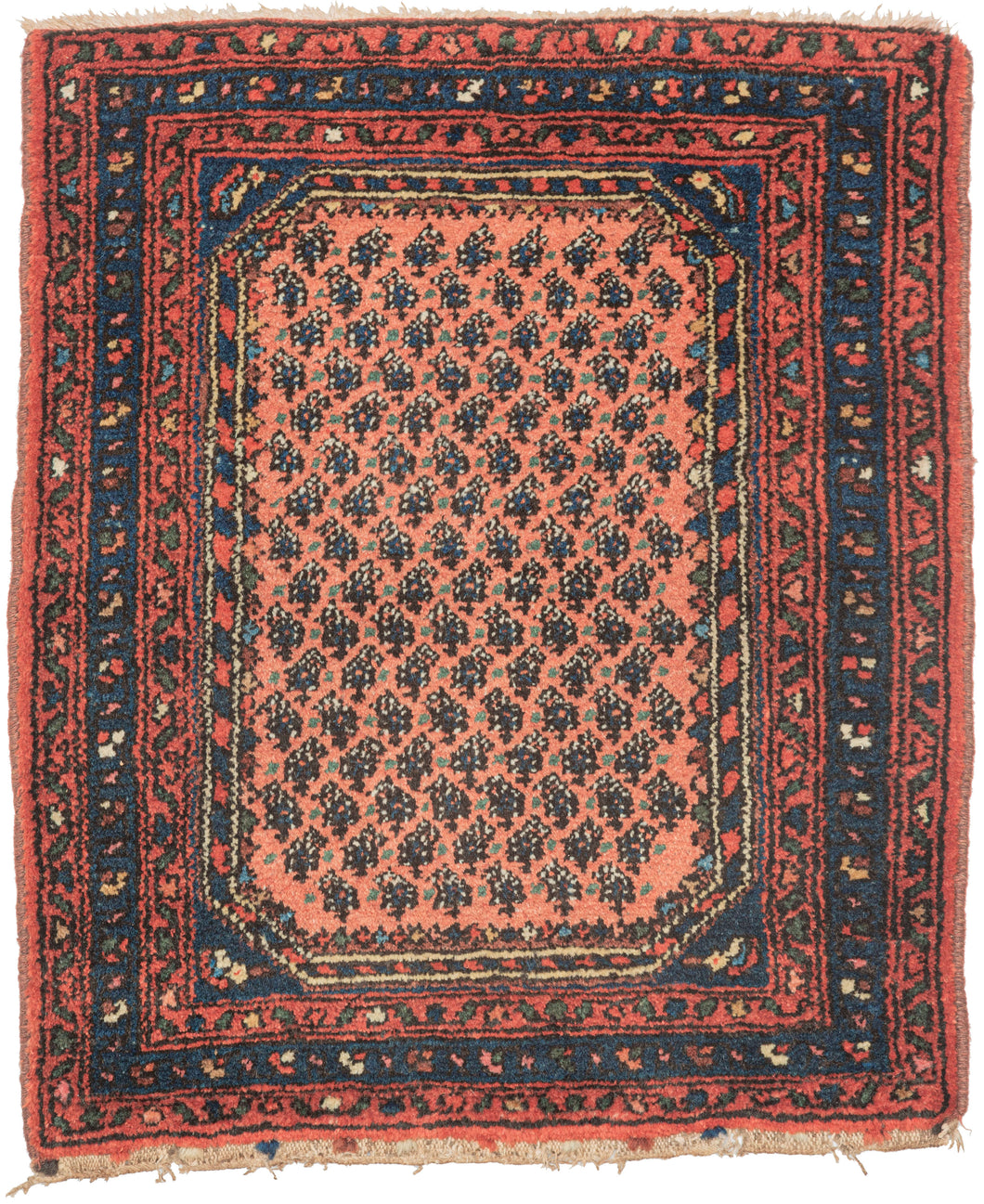 hamadan It features alternating rows of zoomorphic botehs on a coral ground. It is encapsulated by a striped octagonal border with polychrome triangles around the interior and blue cornices each with a single leaf. Framed by a main blue border sandwiched between two red