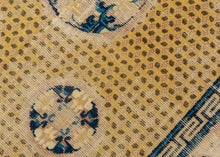 Ningxia Rug circa 1800 composed of a central mandala flanked by four smaller medallions over an intricate diamond lattice repeat. With a classic Ningxia palette that includes two shades of blue, brown, ivory, mauve and a desirable imperial yellow ground. The main border design features floral motifs on a mauve ground. The inner minor borders features a Greek key motif and the outer perimeter border features bands of both blue tones.