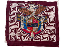 Vintage Mola cloth handmade by the Guna (previously spelled Kuna) people of the San Blas Islands.  Mola is a reverse appliqué technique, similar to the technique used in quilting but using multiple layers of different-colored cloth that are first sewn together before a design is created by cutting away different layers. These cloths are traditionally made in pairs tThis Mola features the Panamanian coat of arms with the words "Pro Mundi Beneficio" which translates to "For the benefit of the world".