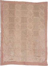 This coverlet was crafted during the 20th century in Rajasthan, India. 
It features hand cut mirrors that have been hand-stitched with silk thread into grid and diamond patterns  on cotton cloth dyed with a dusty lilac. The mirrors really sparkle in the right light.