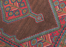 Antique Serab
It features a rosette filled central medallion filled on an open chocolate ground and flanked by floral spray cornices in vibrant rose, sky blue, fern green and ivory.  Nicely framed by a chocolate brown perimeter which strikes the perfect balance with the open field and further highlights the use of the uncommon tone.