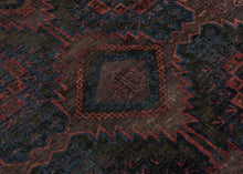 Timuri Baluch was handwoven during the second quarter of the 20th century in Western Afghanistan.
It features a lattice pattern of stepped diamonds and serrated polygons. With lush deep blue and red wool with a dark but lustrous complexion. The addition of a dark brown which has oxidized naturally sculpts the pattern and gives the shapes the feeling of floating in space. Bright speckles of white cotton have been woven around the main border adding a subtle touch of electricity. weft float