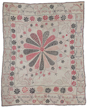 Antique Kantha featuring a central floral mandala with vegetal forms in each cornice. It has a limited palette of various red and black threads on plain white cotton ground. The red and black threads were likely harvested and reused from old clothing.  A mixed border of local fish (Ilish) on the vertical and birds (Doyel) on the horizontal frame the whole. Look closely to notice two small birds in one cornice.