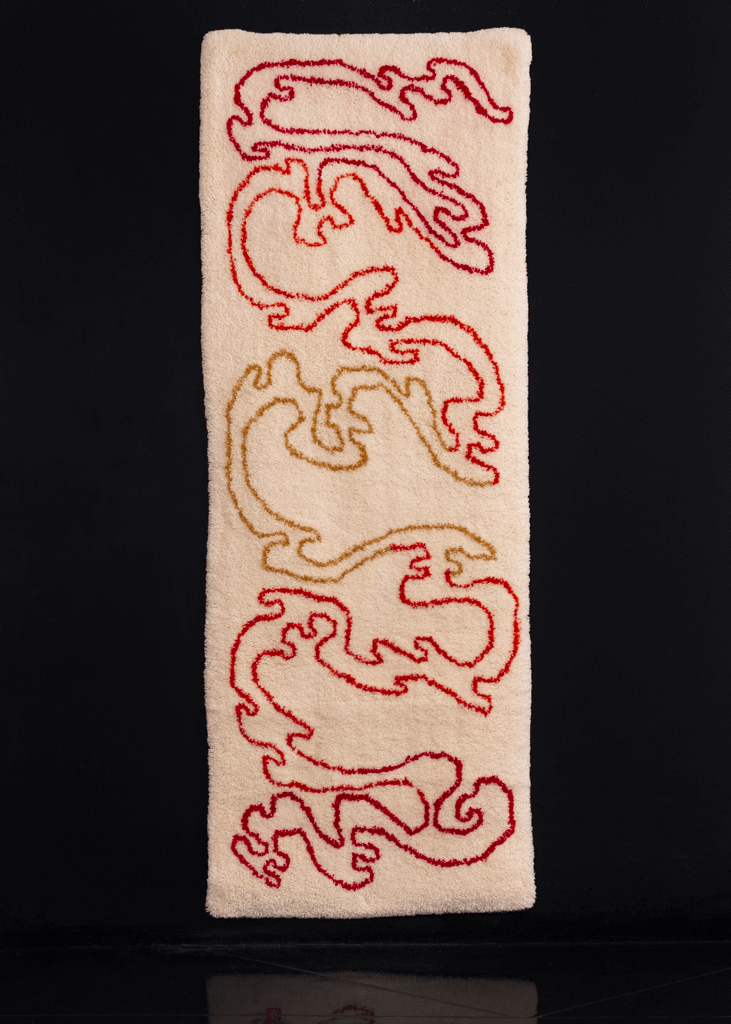 Handmade tufted rug with red, orange and yellow atop ivory ground. Curvilinear design spreads vertically transitioning from one color to the next.