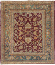 Late 19th century Indian Amritsar rug featuring an elegant all-over design of palmettes, detailed blossoming vines, and groupings of curled leaves on a rich crimson ground. The crimson tone utilizes lac which is a dye derived from insects and characteristic of Northern India weaving from both Amritsar and Agra. With accents of gold, wheat, ivory, and pink. The whole is framed by a spectacular turquoise with a wonderful, undulating abrash that even has some moments of soft purple.