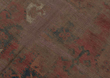 SILK KINTSUGI A soulful early Ersari Turkmen rug, measuring with a beautifully aged surface and a striking contemporary repair. The field is arranged with large-scale Turkmen guls in a soft, time-muted palette of deep red, brown, indigo, charcoal, and ivory. Years of wear have softened the design, giving the rug a quiet, atmospheric quality while still preserving the rhythm and strength of its original tribal composition.