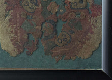 This Coptic textile was woven in Egypt or the Levant during the 6th-7th century AD.&nbsp;

It features a roundel with various faces and vegetal motifs on a earthy red ground. It is framed by rounded borders including a main latchhooked border. With tones of green, purple and yellow to go with the wheat colored linen classically found in these textiles.&nbsp;