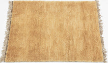 This Anatolian rug was handwoven in Western Turkiye in 2024.&nbsp;

It was handwoven using small-batch wool that has been handspun and naturally dyed. The golden yellow dyestuff is derived from chamomile and other locally foraged flowers.A true celebration of traditional techniques and natural dyeing.