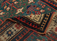 This rug was woven in the South Caucasus in or around the Karabagh region and is dated as 1281 Hijri or 1864 in the Gregorian calendar.&nbsp;

It features a rare and poetic allover design of stylized floral shrubs ngrowing from pots and evoking themes of paradise gardens. The uncommon and desirable rich green ground shifts in tone from hunter green to forest green and finally a sublime sapphire blue. The overall rhythm is visually arresting—layered yet orderly, with fine asymmetrical details that animate th