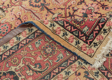 yellow heriz It features a symmetrical all over garden lattice that is densely populated with stylizes floral rosettes, palmettes, and leafy vines in soft coral, midnight blue, ivory and pistachio on a rare golden yellow ground.&nbsp; The red ground main border is composed of blossoming&nbsp;palmettes and crisply rendered saz leaves. A soft-spoken palette that is well-balanced plays off of contrast. Densely woven of high-quality wool making a hard-wearing new production piece that properly honors