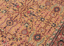 yellow heriz It features a symmetrical all over garden lattice that is densely populated with stylizes floral rosettes, palmettes, and leafy vines in soft coral, midnight blue, ivory and pistachio on a rare golden yellow ground.&nbsp; The red ground main border is composed of blossoming&nbsp;palmettes and crisply rendered saz leaves. A soft-spoken palette that is well-balanced plays off of contrast. Densely woven of high-quality wool making a hard-wearing new production piece that properly honors