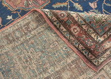 This piece showcases a graceful allover floral design anchored by a central medallion in soft rose and muted green tones. The generous borders, framed in sky blue and rust, add depth and contrast while highlighting the sophisticated floral latticework in the field. Finely woven with a dense, durable pile, this rug embodies the exceptional craftsmanship for which Sarouks are renowned