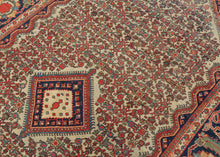 worn ivory mahal rug herati design