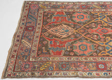 A confident&nbsp;Bidjar with a saturated red field and bold geometric medallion composition. Angular motifs in indigo, ivory, and saffron are crisply articulated, creating a dynamic interplay of symmetry and movement across the surface.