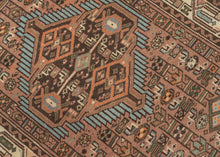 A lively small Hamadan with a geometric medallion composition set against a warm rose-brown field. Crisp ivory, turquoise, deep brown, and soft orange accents create strong contrast and rhythmic movement across the surface.