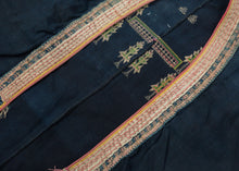 A remarkable ceremonial coat of the Tai Dam, or Black Tai, an ethnolinguistic group historically centered in northwestern Vietnam and neighboring Laos. Known as a sua hi, garments of this type were made for important ritual occasions and were particularly associated with funerary traditions and the passage of the deceased into the ancestral realm.