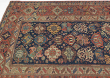 A richly patterned Soumak from the northeastern Caucasus, woven in the 19th century with an unusually varied assortment of boldly drawn floral and geometric forms.

The deep indigo field is densely populated with stylized palmettes, rosettes, blossoms and angular vegetal devices, individually rendered in saturated shades of madder red, blue, green, ivory and golden yellow. The floral vocabulary closely recalls the celebrated Kuba “blossom” rugs, whose fields are similarly animated by large, colorful palmett