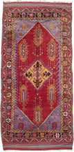 Mid century central Anatolian shaggy kelleghi featuring a yellow and purple latch hooked central medallion flanked by light green and yellow devices reminiscent of hanging lanterns. all on a lively red field. The intoxicating purple tones are further highlighted in the cornices which each feature an ewer among other symbols.