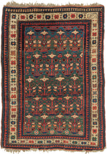 This rug was woven in the South Caucasus in or around the Karabagh region and is dated as 1281 Hijri or 1864 in the Gregorian calendar.&nbsp;

It features a rare and poetic allover design of stylized floral shrubs ngrowing from pots and evoking themes of paradise gardens. The uncommon and desirable rich green ground shifts in tone from hunter green to forest green and finally a sublime sapphire blue. The overall rhythm is visually arresting—layered yet orderly, with fine asymmetrical details that animate th