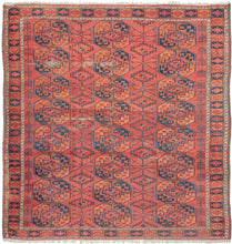 This Ersari Turkmen rug was woven in Northern Afghanistan.  It features a traditional Ersari gül design with a with soft palette of orange and indigo on an earthy madder red ground with accents of natural undyed brown and ivory wool. The secondary guls are more skeletal and interconnected by thin weblike lines. Of particular interest are two columns of amulets on either end of the field which add some distinction and serious interest to this usually straightforward design lexicon.