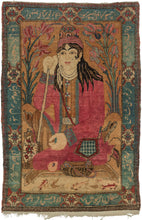 This evocative Qajar rug depicts Nur ‘Ali Shah, the celebrated Sufi saint and poet whose image became widely cherished in the 19th-century.

Remembered as a figure of beauty, charisma, and spiritual devotion, Nur ‘Ali Shah helped embody the revival of Sufism in the Qajar period. His portrait was reproduced across paintings, lacquer, enamel, and carpets, becoming an icon of saintly presence rather than a simple likeness.