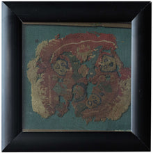 This Coptic textile was woven in Egypt or the Levant during the 6th-7th century AD.&nbsp;

It features a roundel with various faces and vegetal motifs on a earthy red ground. It is framed by rounded borders including a main latchhooked border. With tones of green, purple and yellow to go with the wheat colored linen classically found in these textiles.&nbsp;