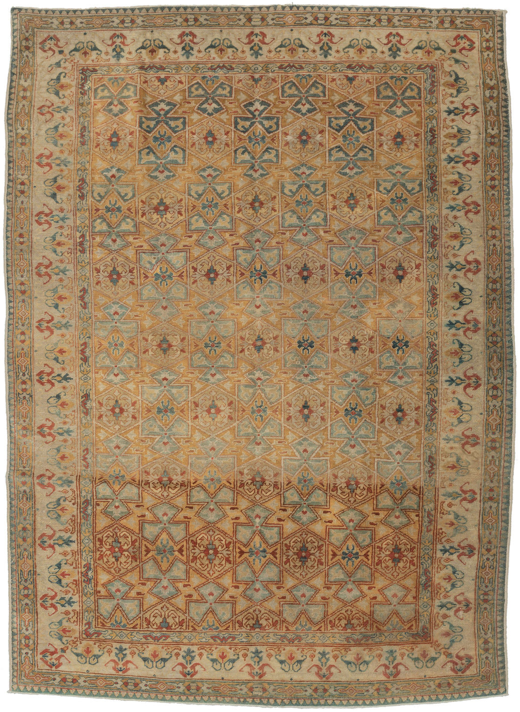Architectural Yellow Sivas Rug features an elaborate and geometric mosaic of rosettes, stars, and latticework that is more commonly associated with architecture and bookbinding. It is contained within the perfectly reconciled main border of meandering vegetal forms.