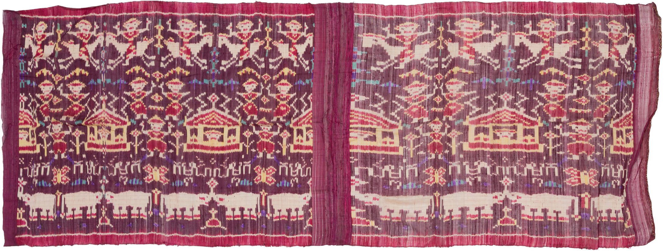 A striking Cambodian&nbsp;hol textile woven in the weft ikat technique, dating to the 1980s revival period. Against a rich plum and magenta ground, the composition features mirrored rows of apsara or court-dancer figures, stylized Angkorian temple forms, floral motifs, and bands of Khmer script identified as reading “Kampuchea.”

The imagery draws on Cambodia’s deeply rooted Angkorian visual language, translating forms associated with temple architecture and celestial dancers into silk. Rather than depictin