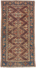 Antique Malayer small runner featuring a bright cream field with an undulating red & blue central diamond pattern. The lively field is framed by the main border of alternating long-armed palmettes and what appear to be heavily stylized butterflies or dragonflies on a stunning indigo ground. The main border is flanked by bright cream minor borders with repeating "S" motifs.