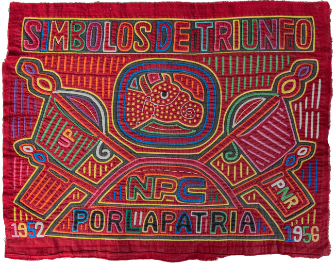 Vintage Mola cloth handmade by the Guna (previously spelled Kuna) people of Panama.  Mola is a reverse appliqué technique, similar to the technique used in quilting but using multiple layers of different-colored cloth that are first sewn together before a design is creating by cutting away different layers.   It features a Bull which is the symbol of The National Patriotic Coalition which is a right wing nationalist party. The text can be translated to 