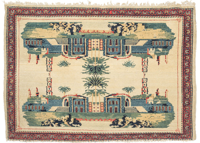 Antique Kashan pictorial rug featuring a scene of the architectural and natural beauty found in the city of Kashan that has been flipped over and reflected in perfect quadrilateral symmetry. It may be depicting Fin Garden - the oldest surviving garden.  Illustrated with calming blues, greens, and yellows with red outlining on a cream ground.  Fun and unexpected, the rendering has a fantastical feel mirage-like feel. 
