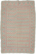 A finely worked Lahori kantha from the Rajshahi region of Bangladesh, densely embroidered in running stitch with alternating bands of faded red and soft blue. The name Lahori or Lohori is generally associated with lahar or lehar, meaning “wave,” a fitting description for the rhythmic movement created by its repeated geometric stitching.