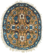 This Midcentury Chinese Silk Oval Rug features a central design reminiscent of the classic herati with curling tendrils and blossoming buds. In a nice oval format with tones of copper, cobalt, green and cool ivory.
