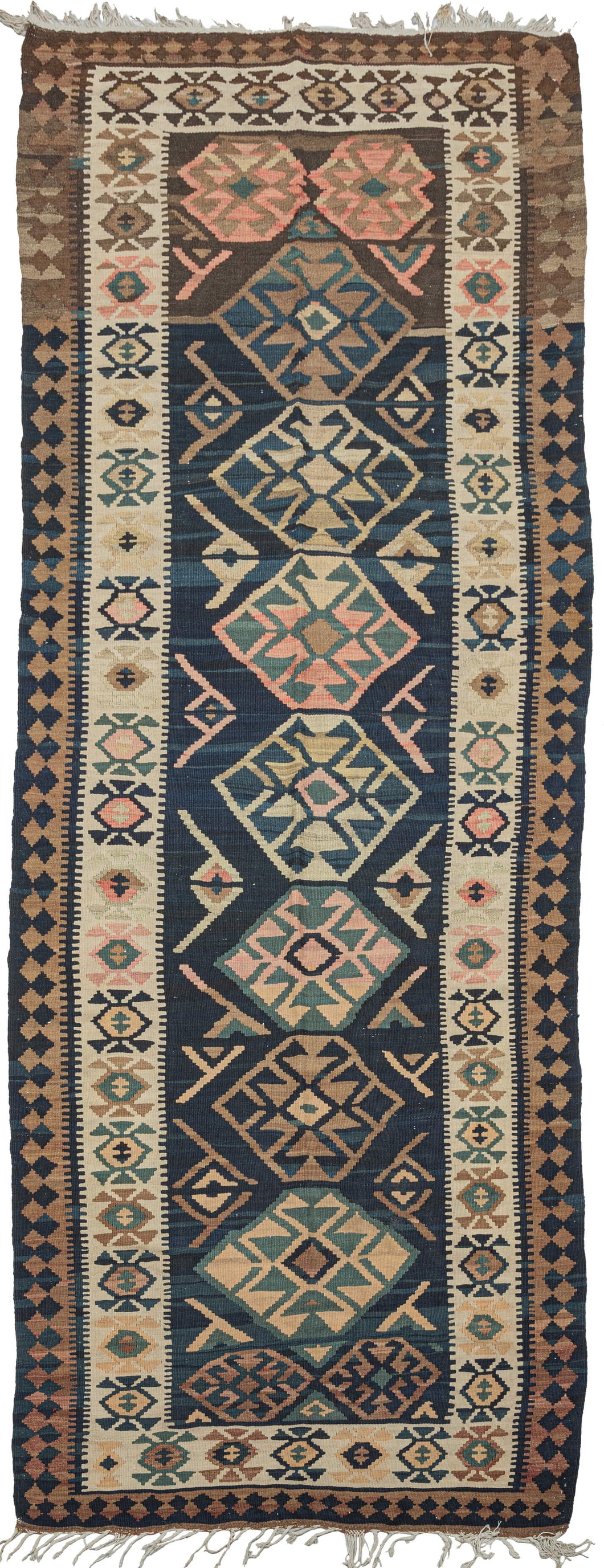 kelleghi kilim runner featuring a stunning indigo blue field, with a bold geometric design of medallions and line shapes. Soft browns, ivories and watermelon complete the color palette.