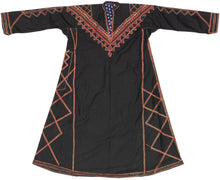 A restrained and graphic Palestinian thobe from the Beersheba and Negev Bedouin region, distinguished by its dark ground, linear embroidery, and emphasis on structure rather than surface density.

Embroidery is sparingly but decisively applied, focusing on the chest, sleeves, side panels, and hem. Angular zigzags, stepped triangles, and linear motifs are arranged in bold vertical registers, while the chest features a sharply defined V-shaped yoke edged with serrated borders. Decorative stitching along seams