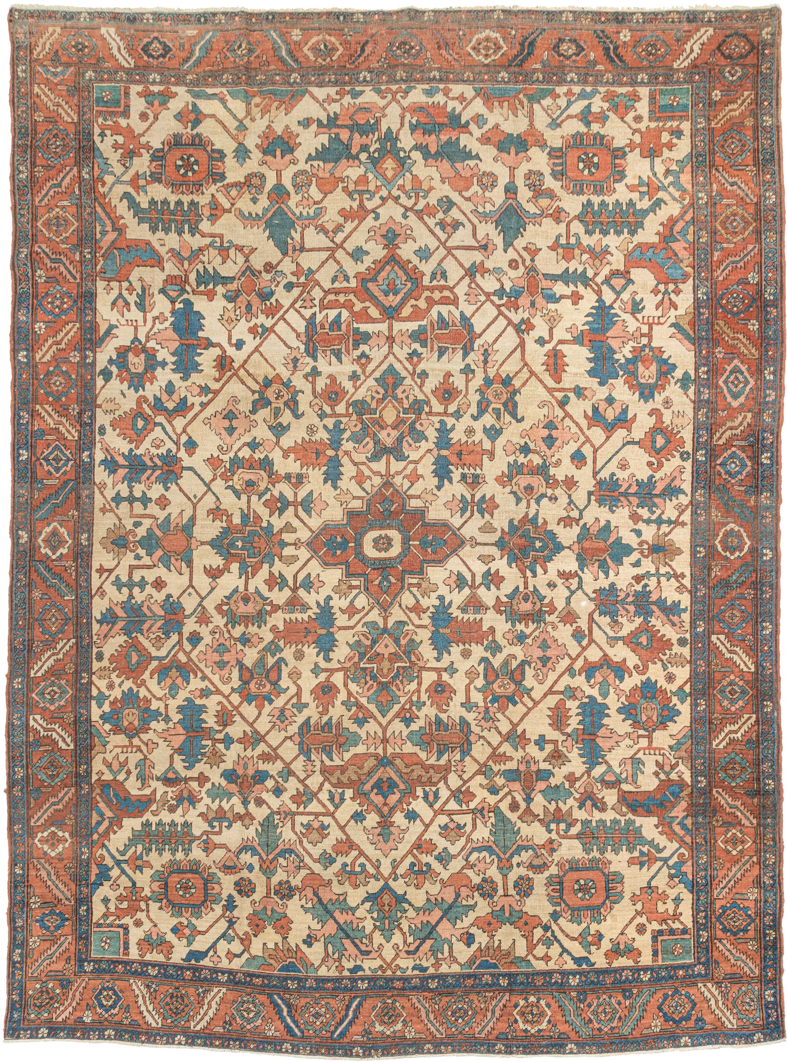 A powerful and beautifully balanced antique Serapi woven at the height of the tradition in the late 19th century. A spacious lattice is filled with large-scale, angular floral and leaf forms and set on a desirable ivory ground. The drawing is confident and architectural, with generous spacing that gives the design clarity and presence.The palette is classic and softly aged, combining brick red, terracotta, indigo, and blue-green tones against the warm ivory ground. The colors retain depth while showing the 