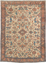 A powerful and beautifully balanced antique Serapi woven at the height of the tradition in the late 19th century. A spacious lattice is filled with large-scale, angular floral and leaf forms and set on a desirable ivory ground. The drawing is confident and architectural, with generous spacing that gives the design clarity and presence.The palette is classic and softly aged, combining brick red, terracotta, indigo, and blue-green tones against the warm ivory ground. The colors retain depth while showing the 