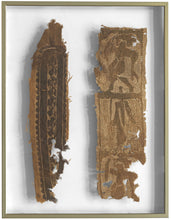Two early Coptic tapestry-woven fragments, mounted and framed for preservation and display. Darker bands and figural elements emerge subtly from the undyed ground, their forms softened by time yet still remarkably legible.

The left fragment retains a vertical ornamental band with repeating roundels and stylized motifs, while the right preserves portions of figural decoration, likely once part of a larger tunic panel or furnishing textile. The earthy palette and rhythmic geometry are characteristic of Late 